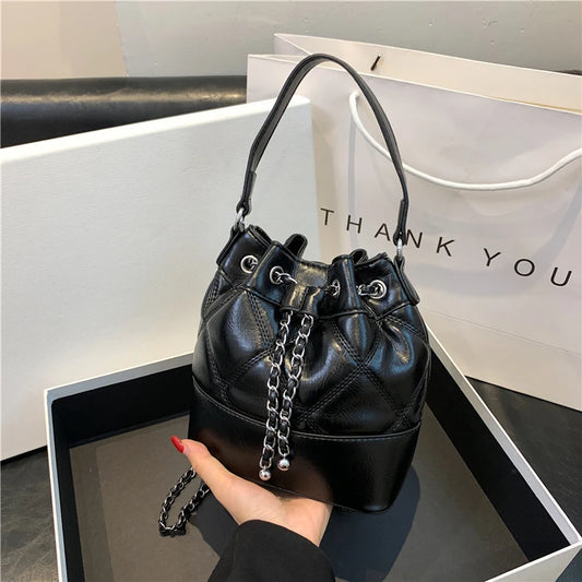 Grande sacoche cuir à cordon femme
