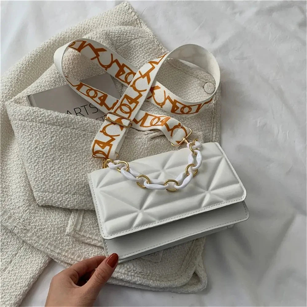 Sacoche rembourrée carreaux femme sophistiquée